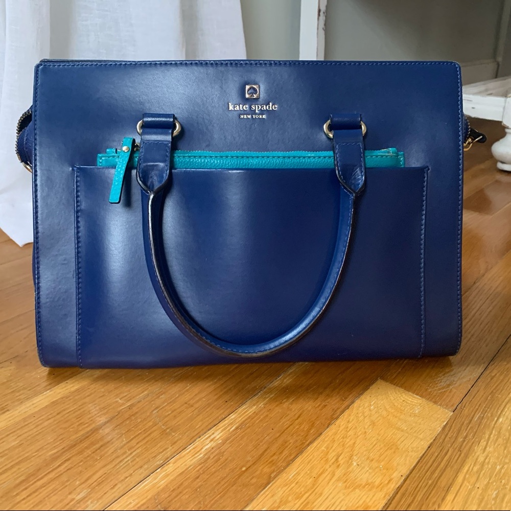 Kate Spade hand bag. 12x9. Blue with turquoise pouch detail